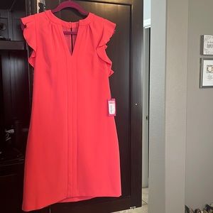 Vince Camuto coral above the knees dress.